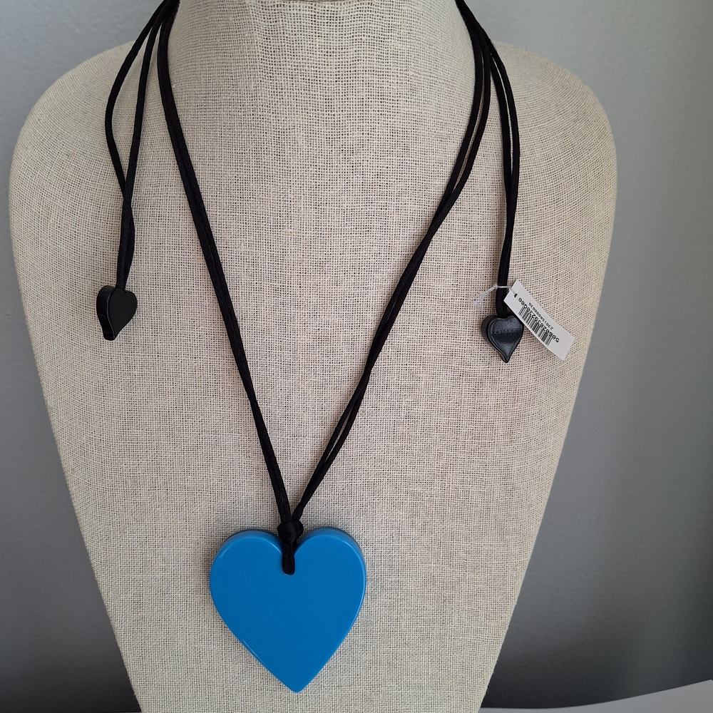 Zsiska Elegant blue heart pendant necklace with a sleek black cord.
